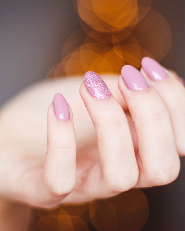 Minimalist nail art with negative space